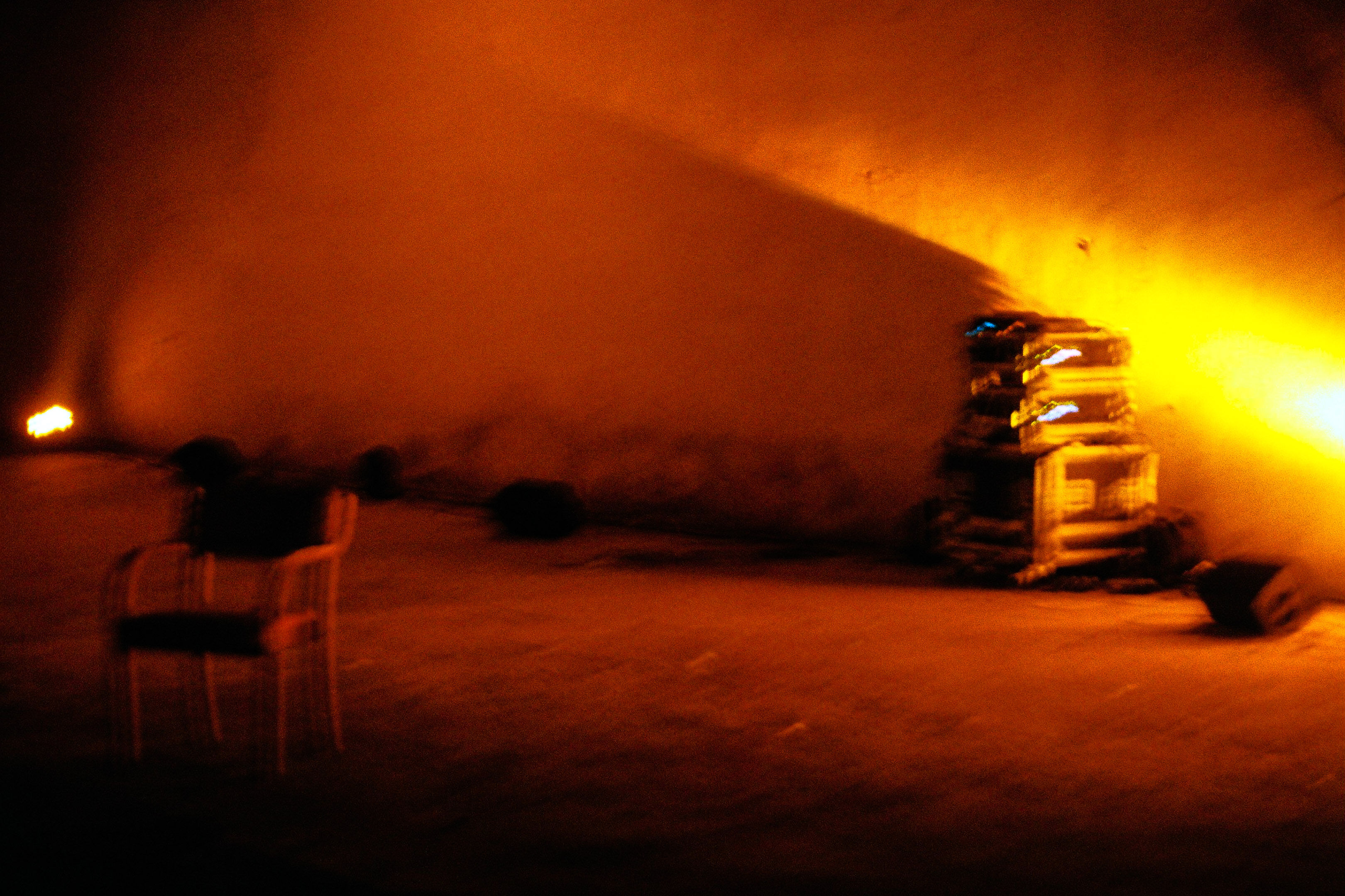 room with chair in orange light