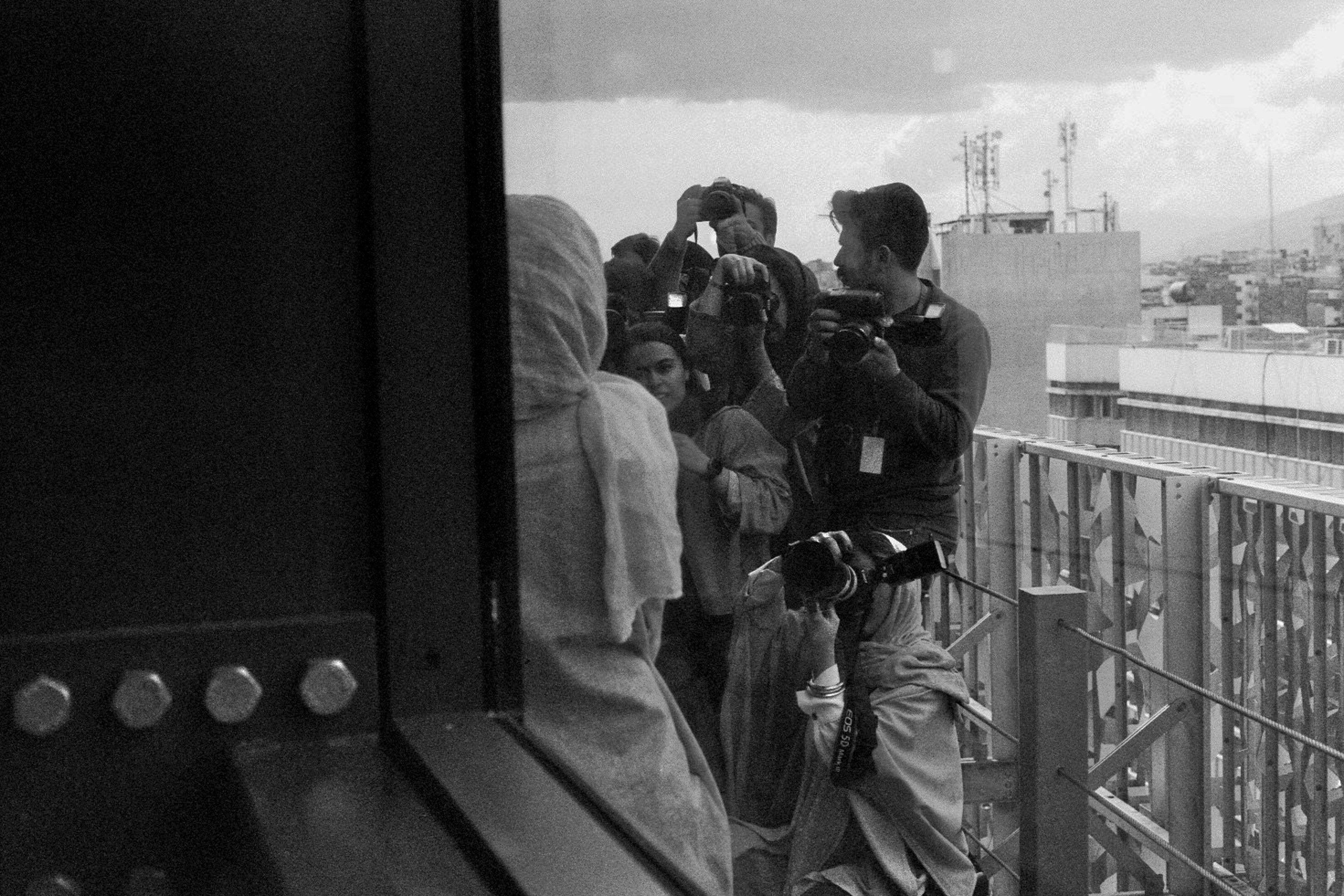 Fotocall on balcony in Tehran