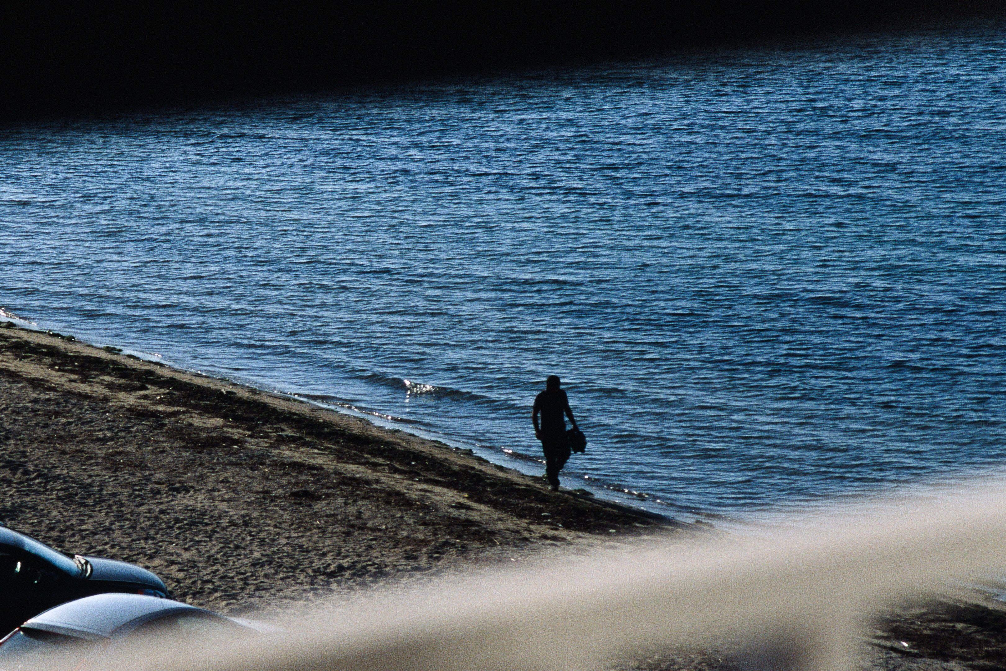 man silhouette on the beach