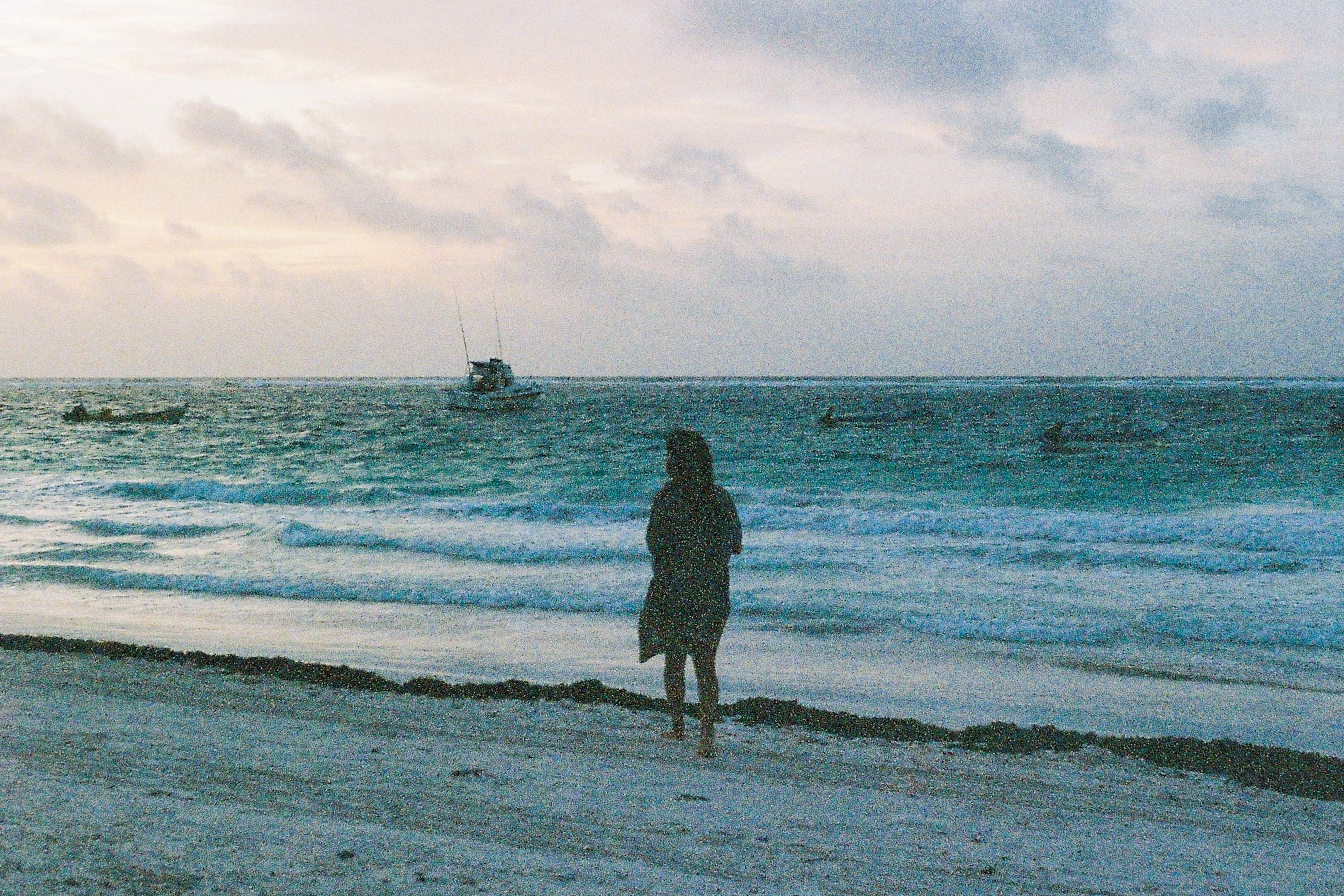 woman at the beach looks like a painting